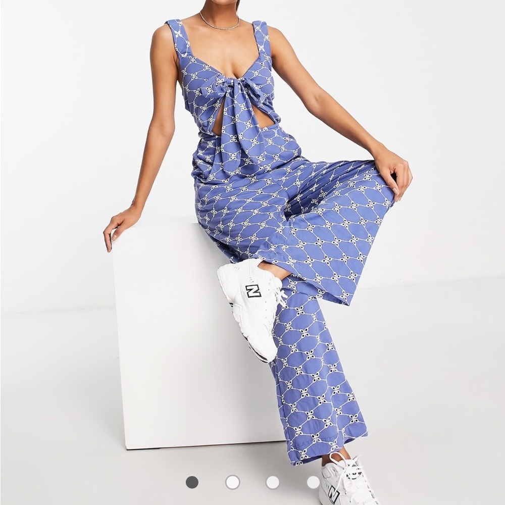 ASOS Design Jersey eyelet elasticated back jumpsuit in blue